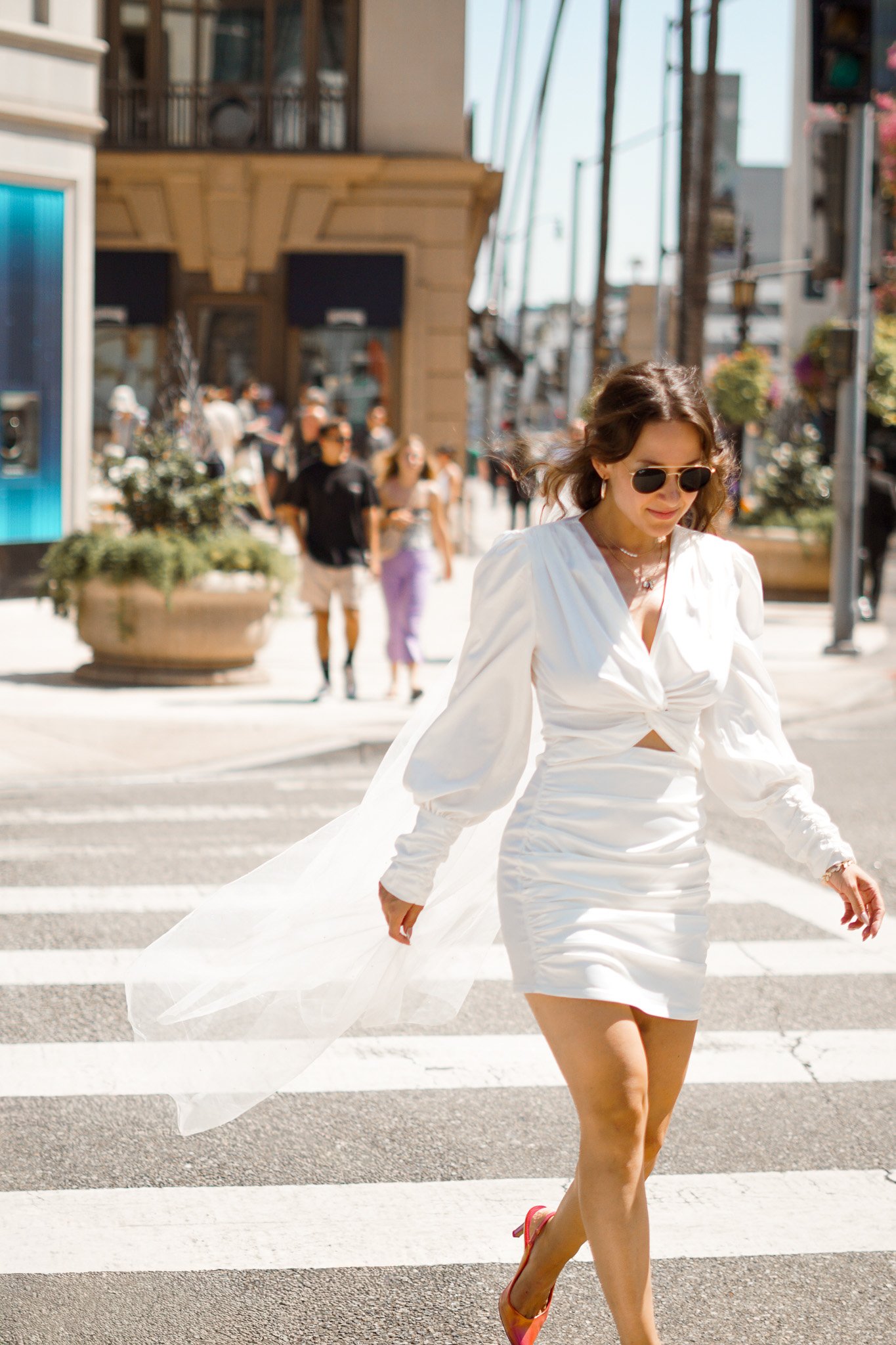 Woman wlking over crosswalk