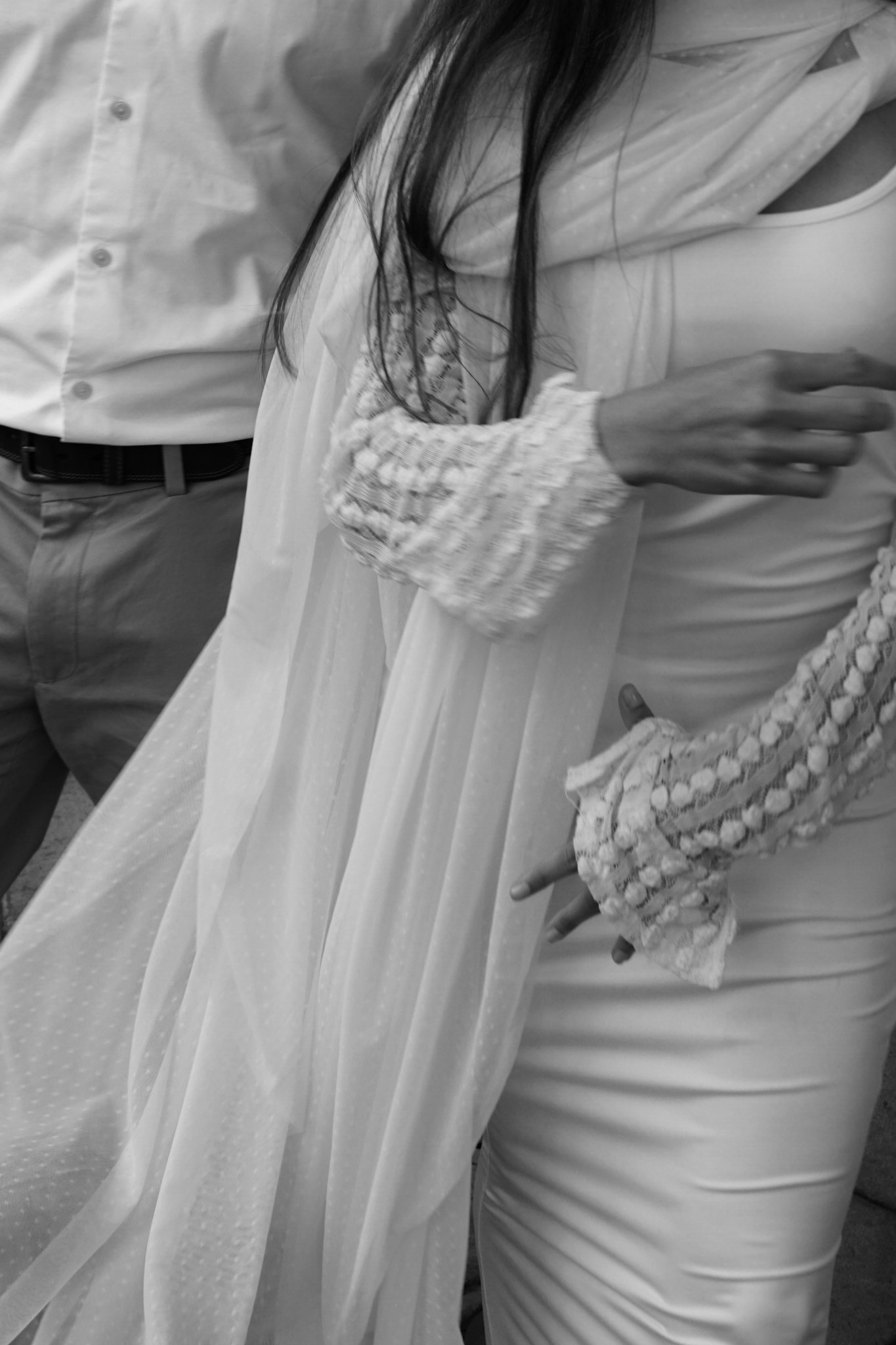 close up from Bride, with highlights from vail and dress