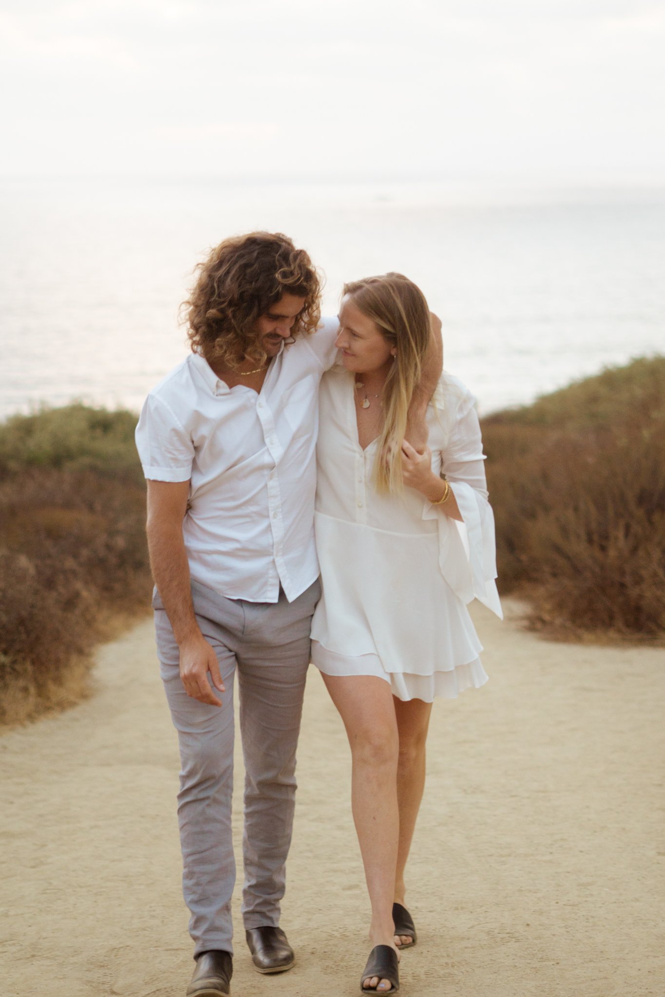 woman amnd man walking together close