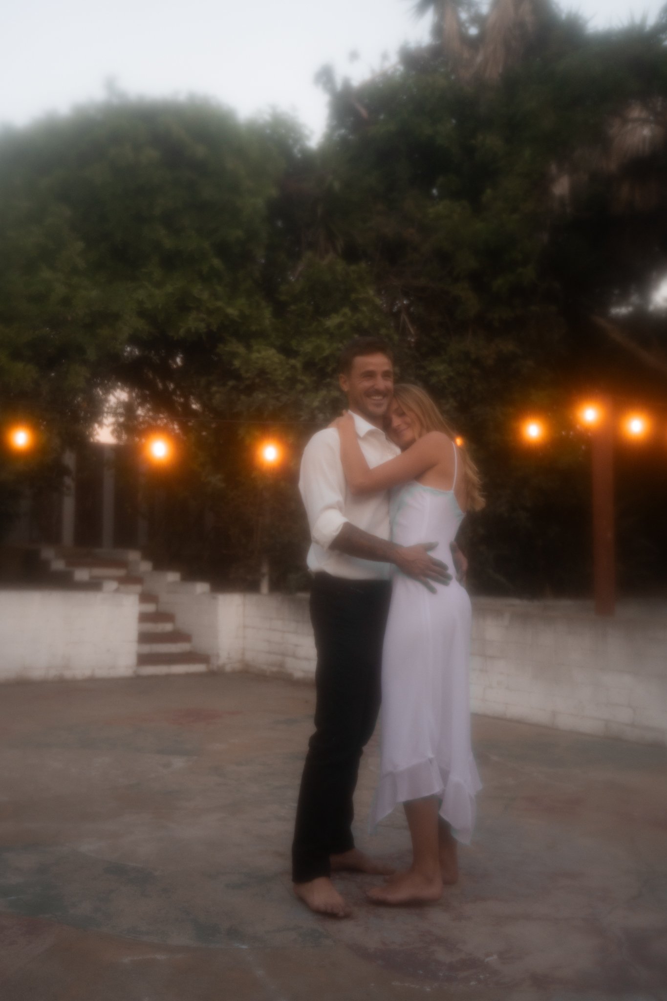 Couple dancing in the backyard wedding
