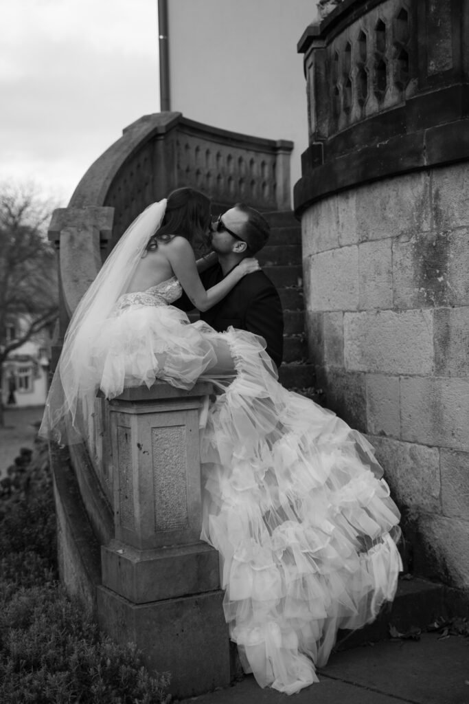 Kissing picture on stairs up to the castle entry