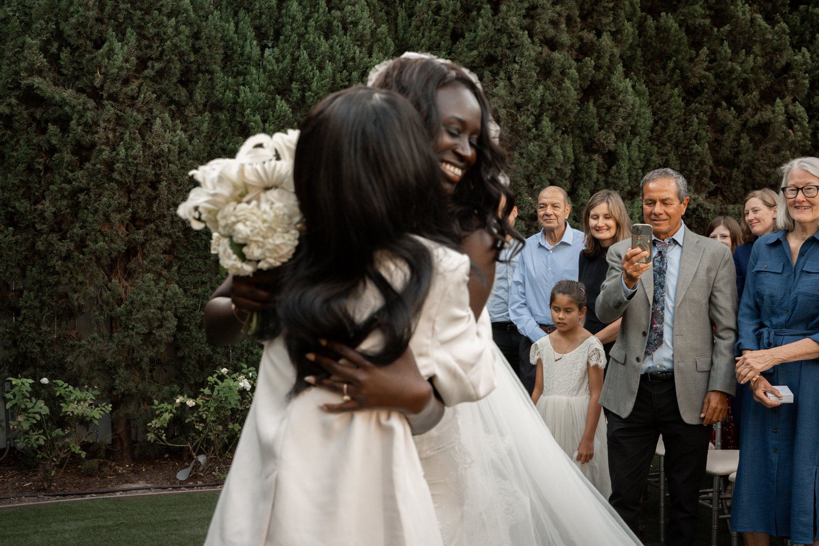 bride hugging mom after walking down to the altar