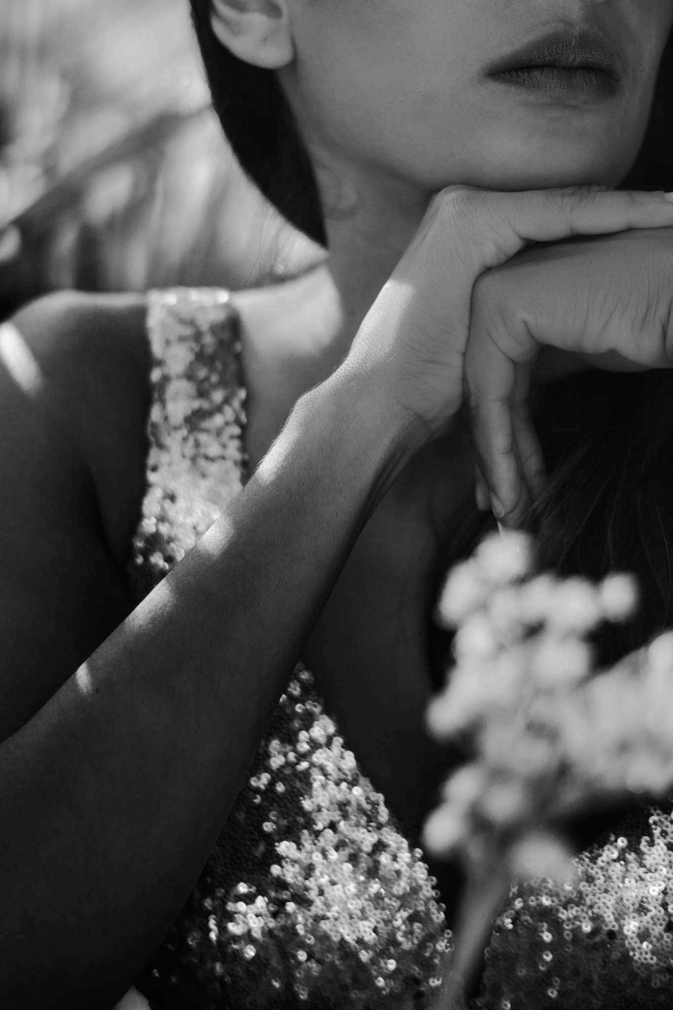 Woman with glittering dress and hand