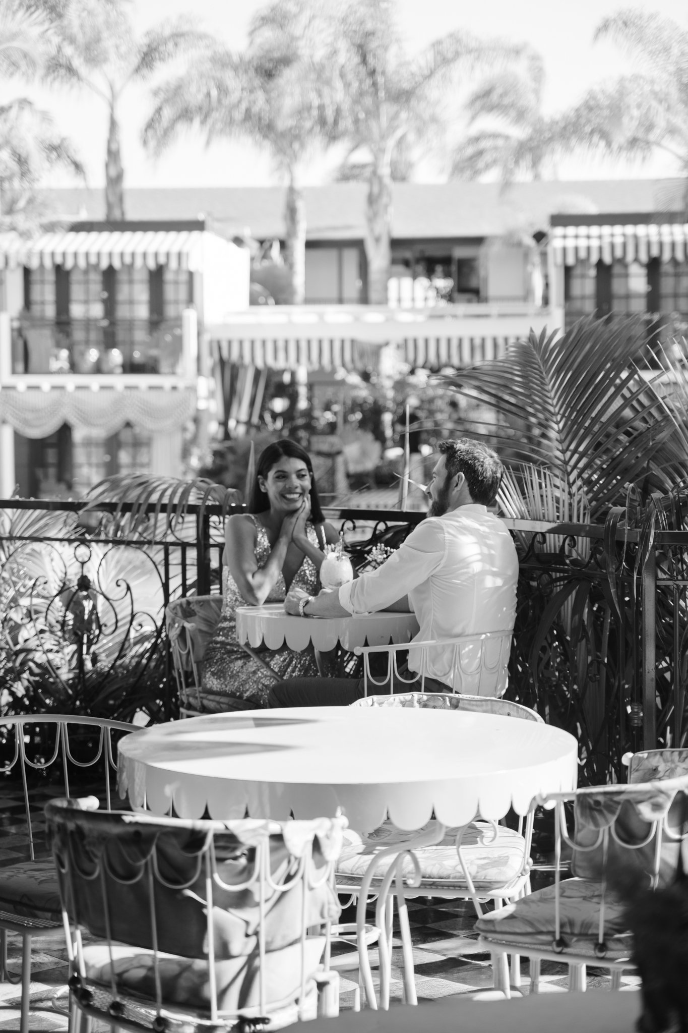 Black and white picture of terrace and couple.