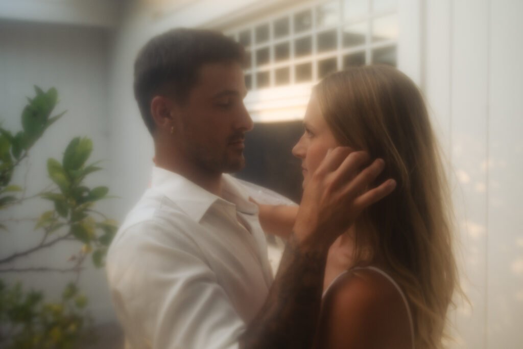 Man touching Womans face gently