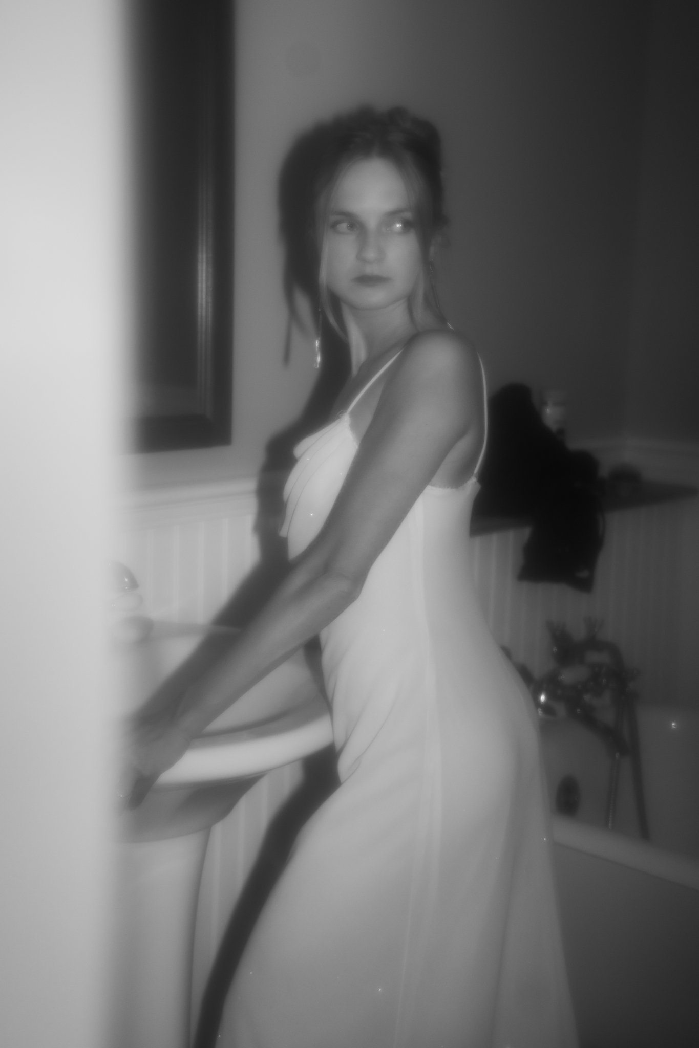 Woman standing in restroom