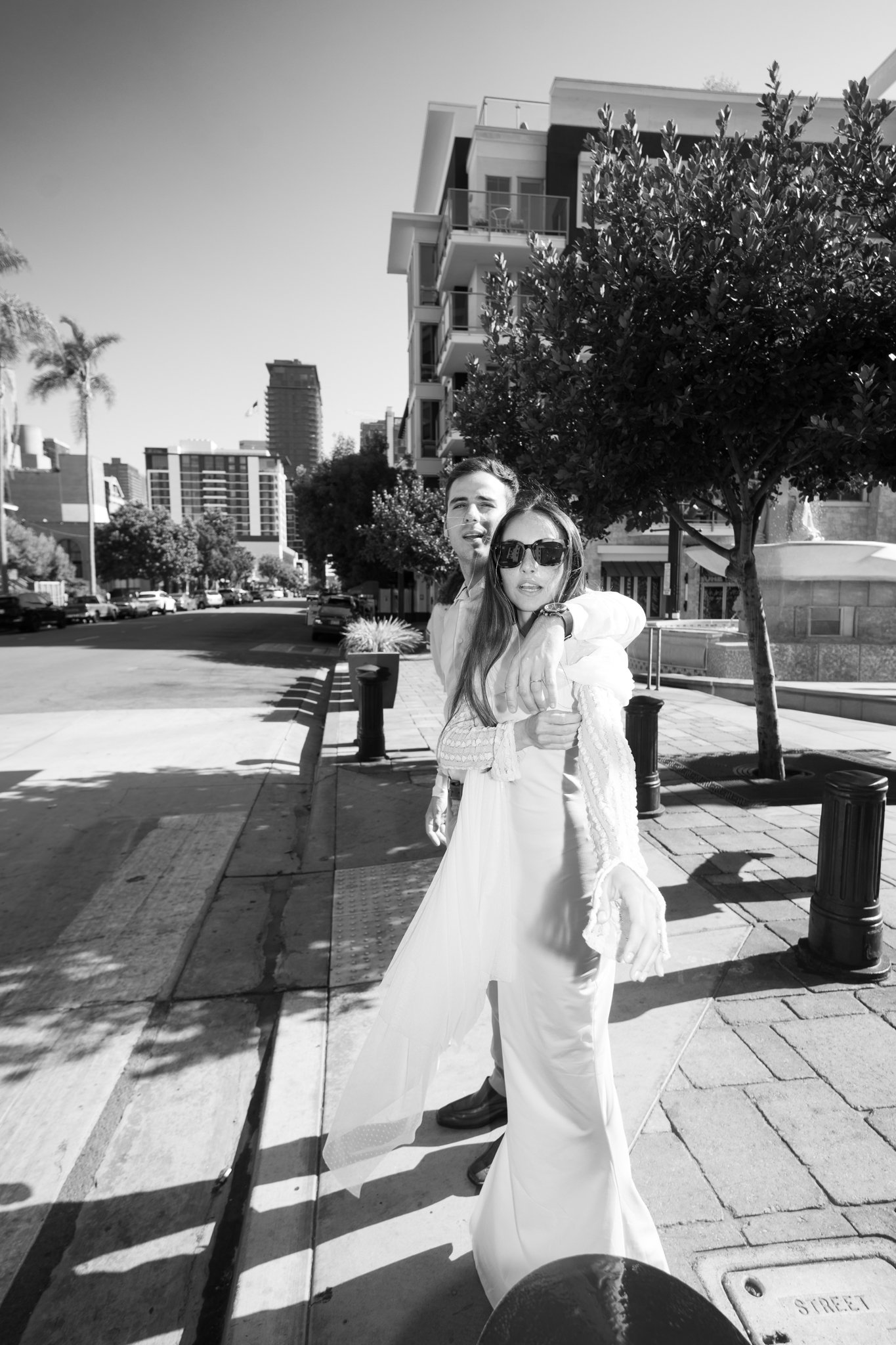 Groom and Bride on Streetside, about to walk the crosswalk