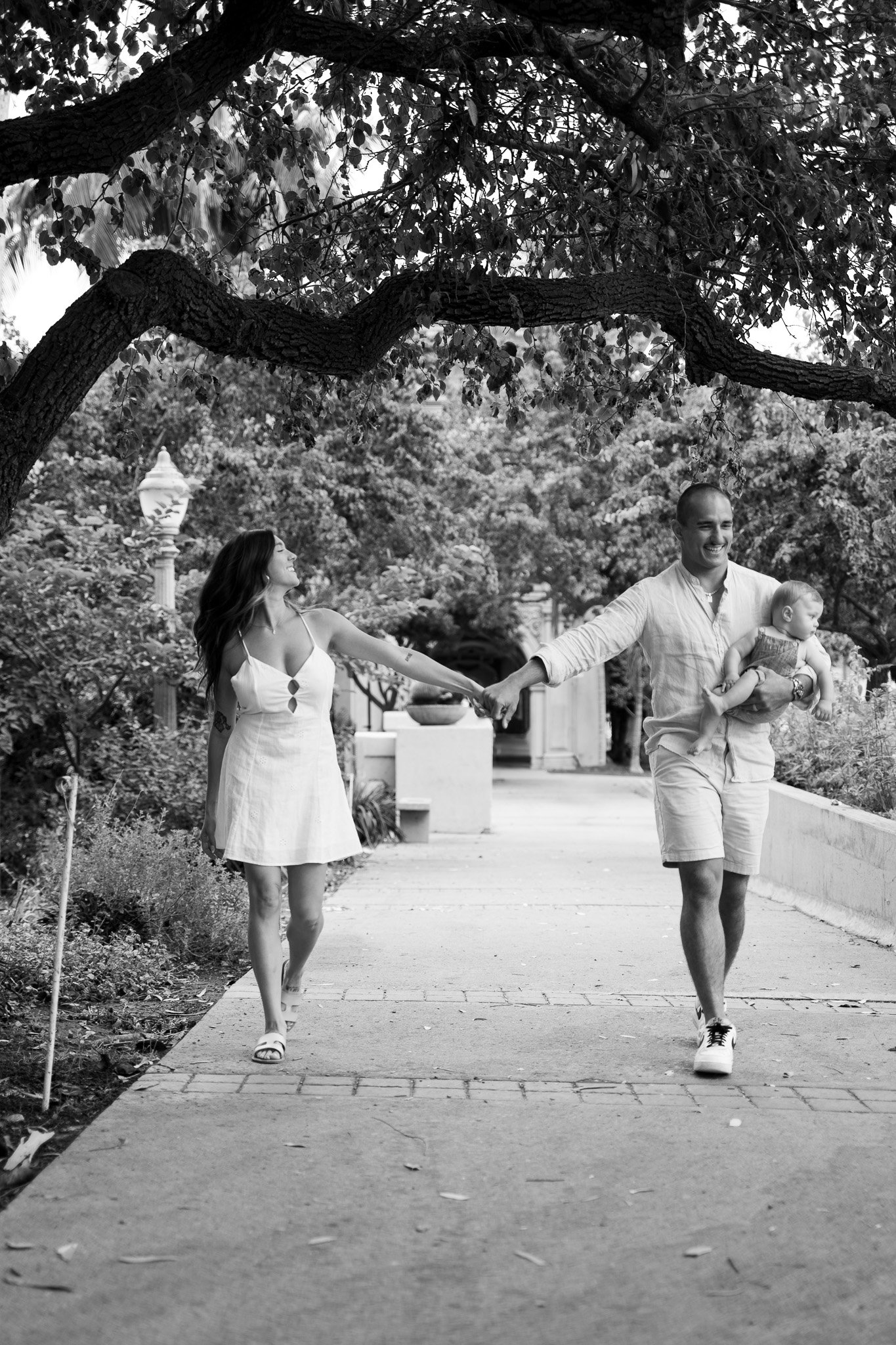 Family holding Hands and walking, black and white picture