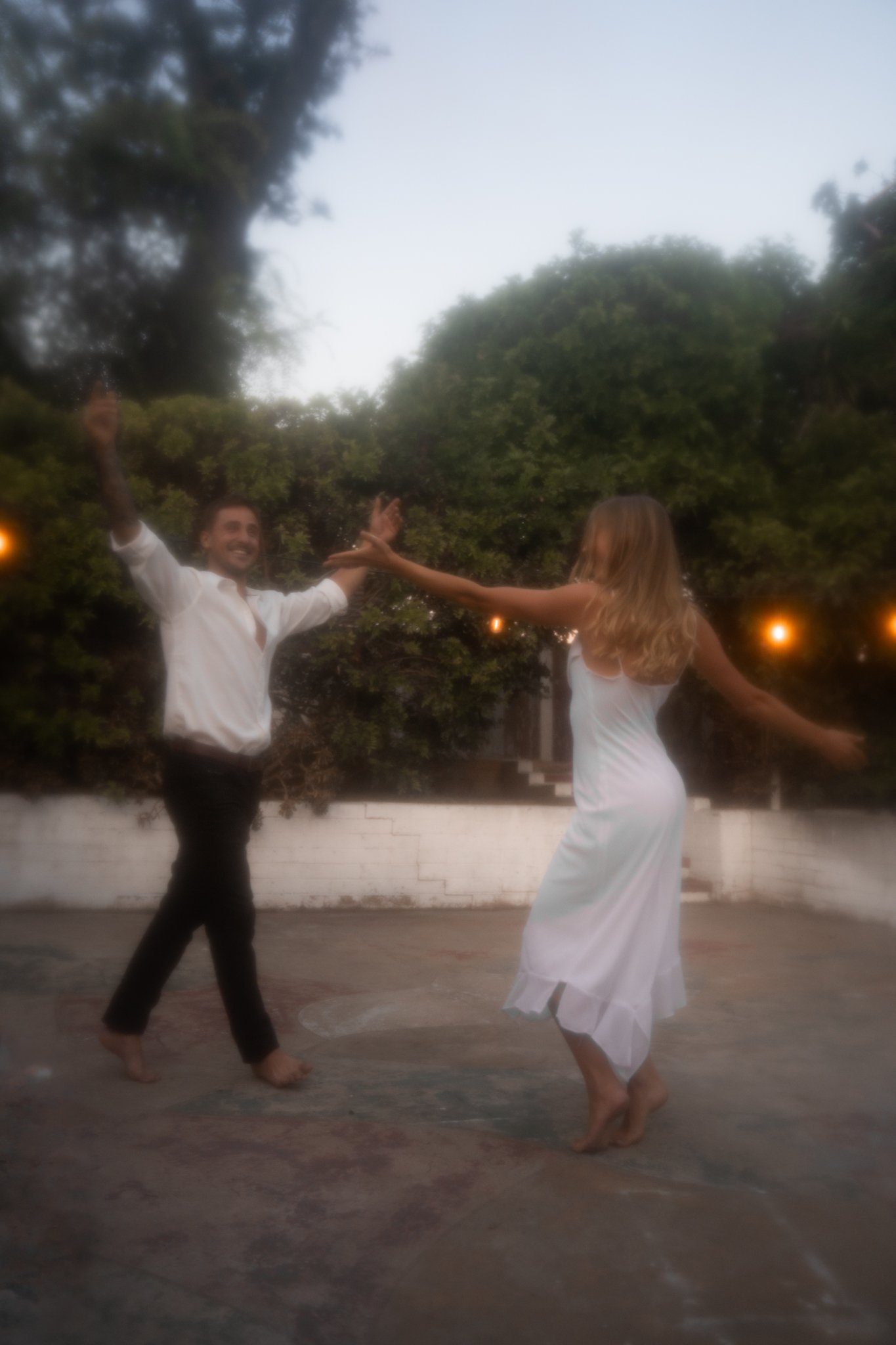 Woman and Man dancing at wedding.