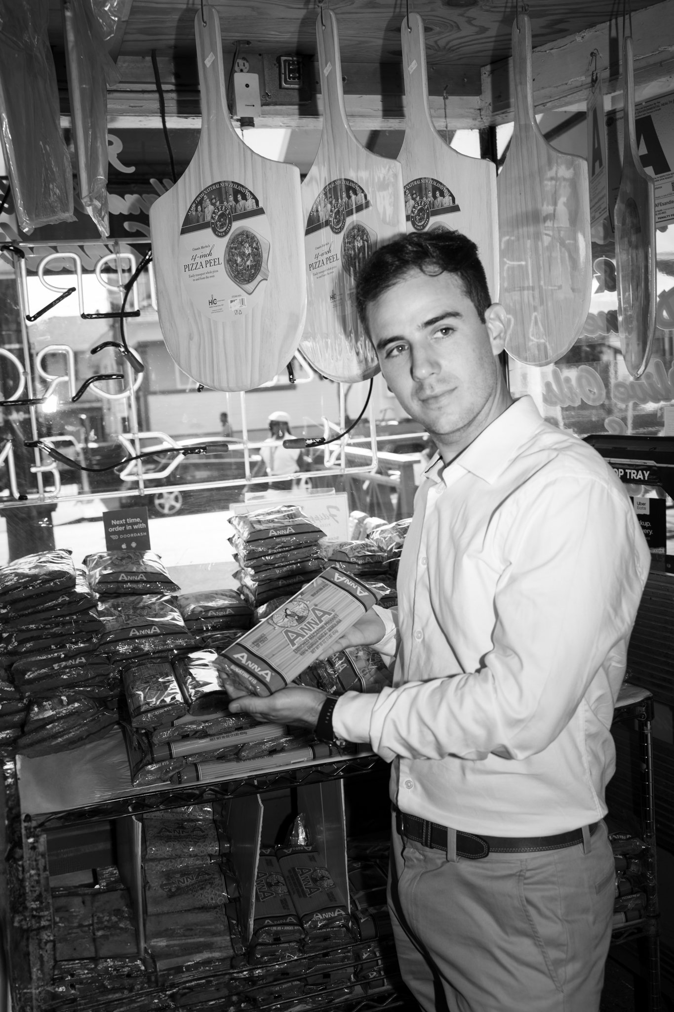 Groom pointing at showcase in Italitan Store