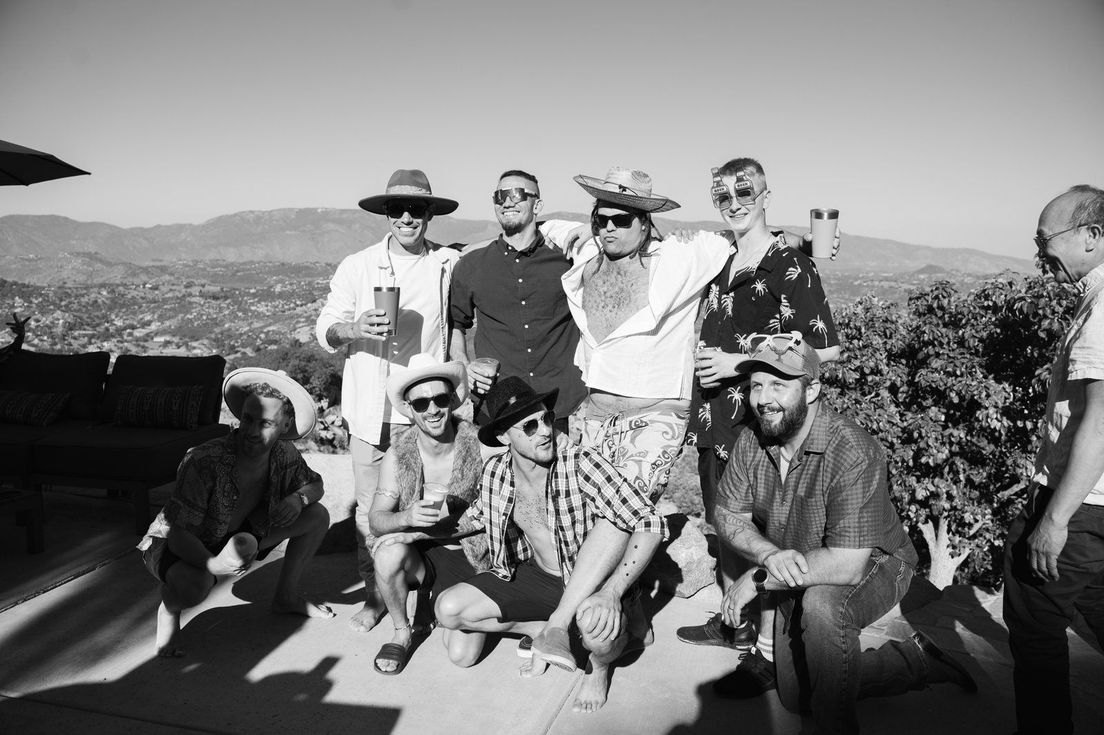 Group of man posing for photo