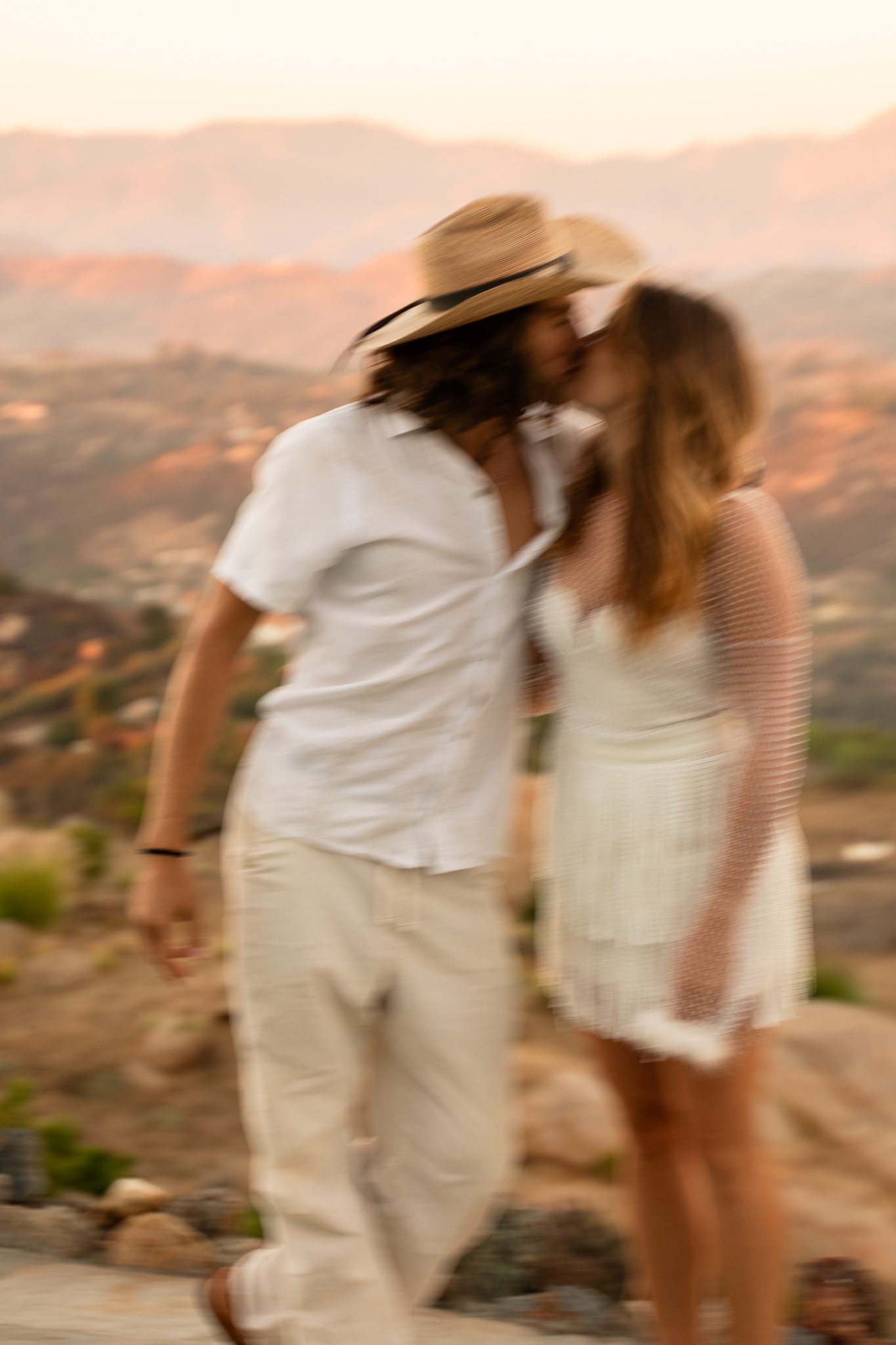 man and woman kissing
