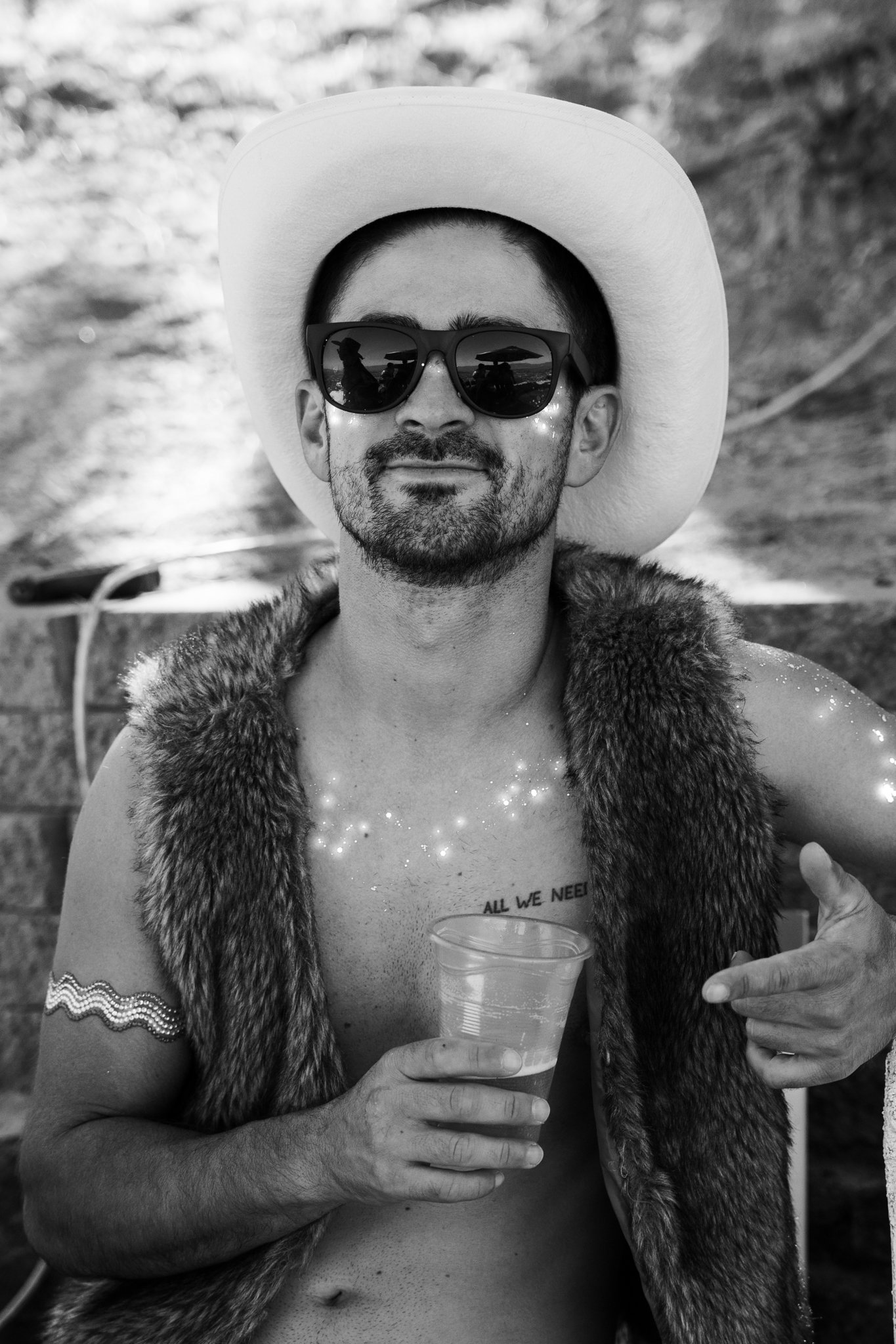 Man with cowboy hat and sunglasses