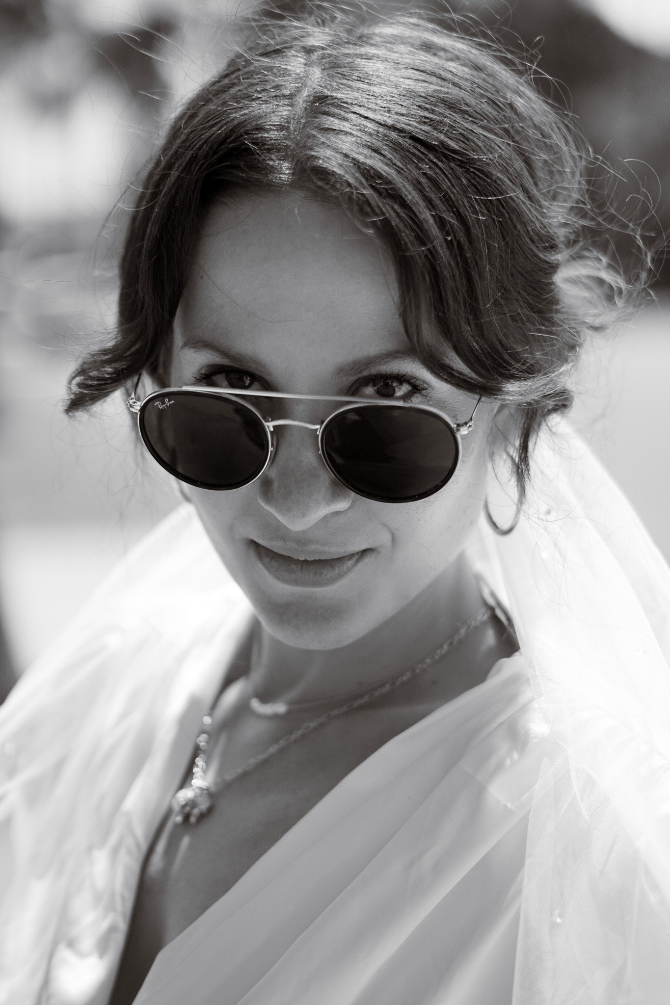 woman straight look to camera with sunglasses