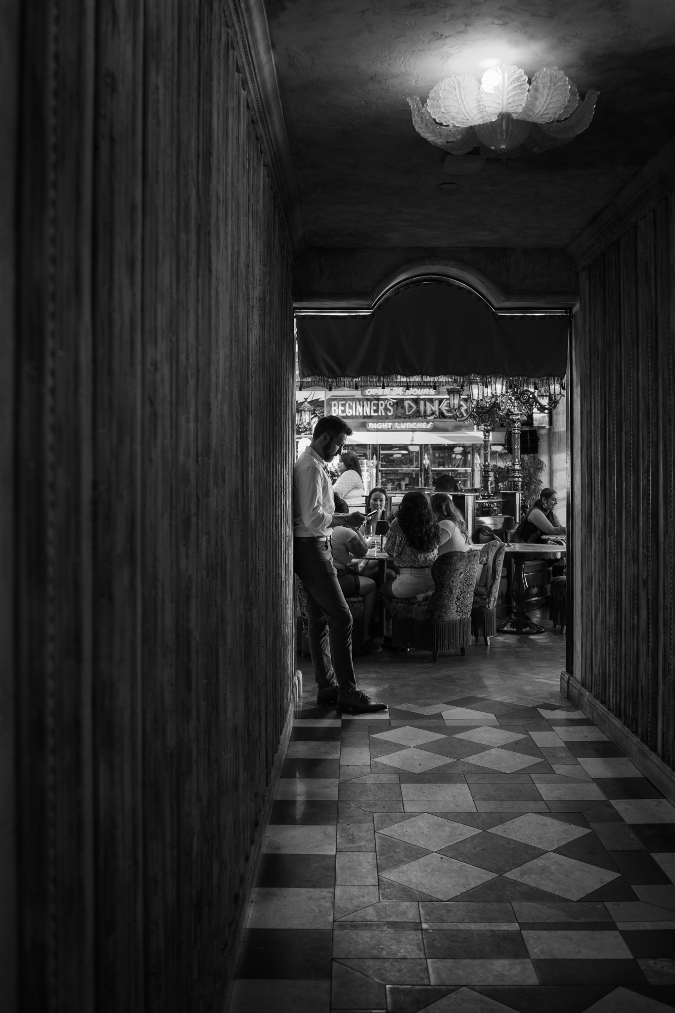 Kirk standing in Hallway, waiting.