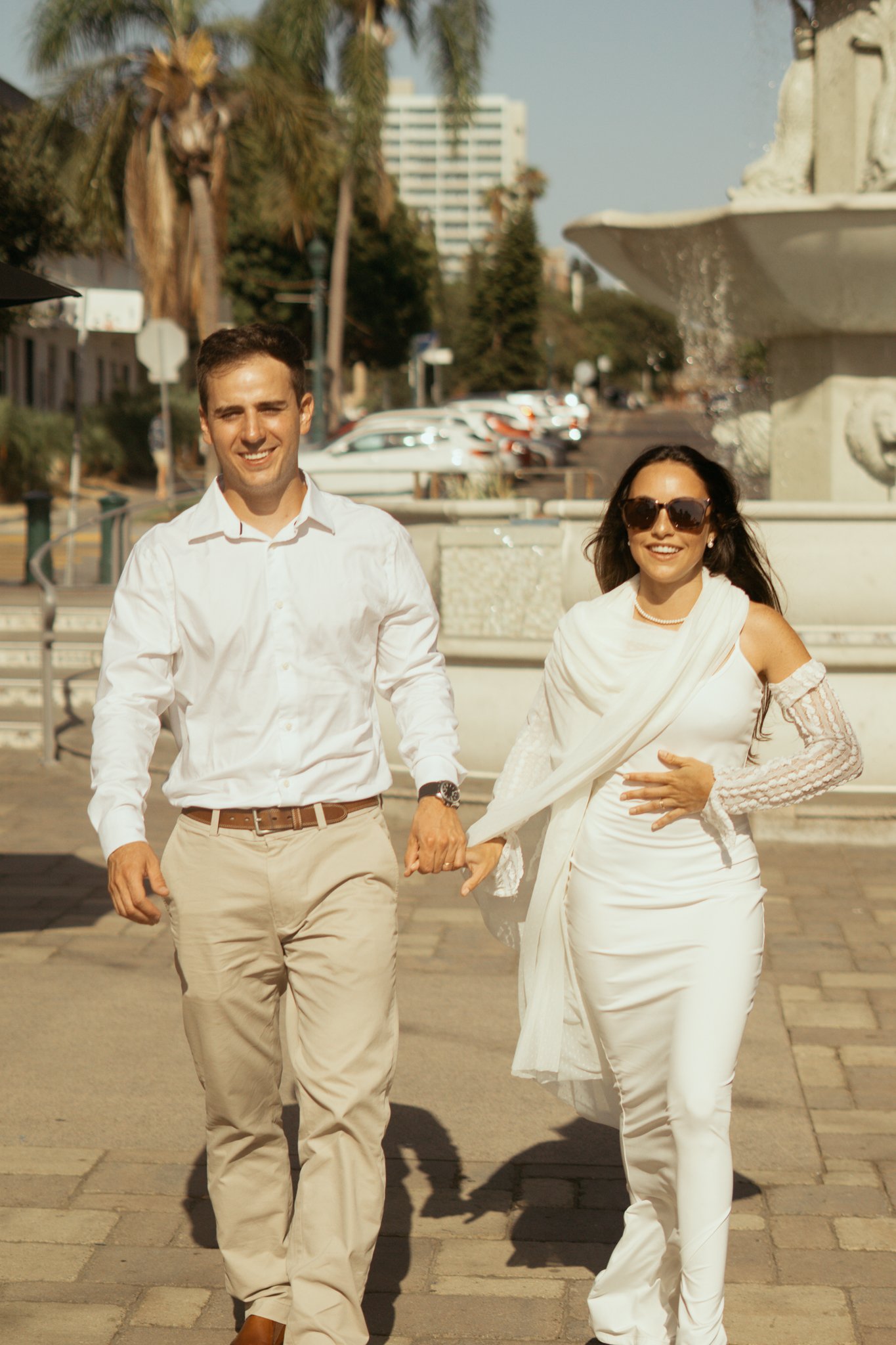 Pedro and Male walking to Camera in Little Italy, San Diego